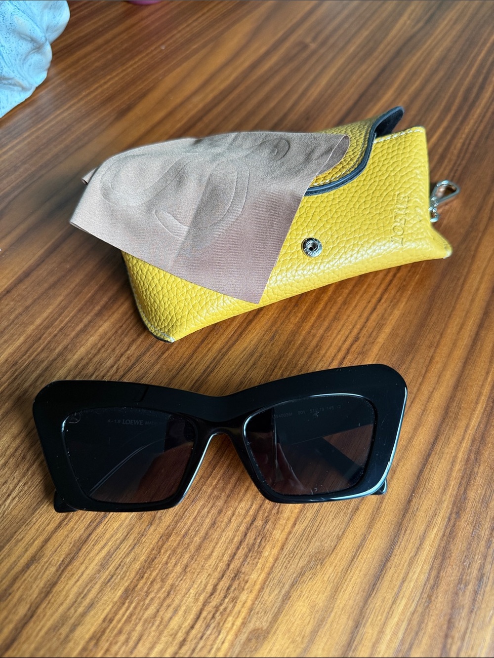 Loewe Black Cat-Eye Sunglasses with Yellow Case